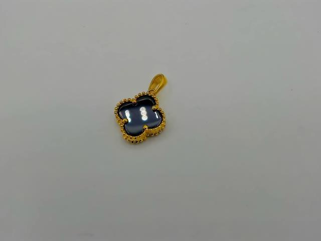 BRELOQUE EN OR 10KT NEW