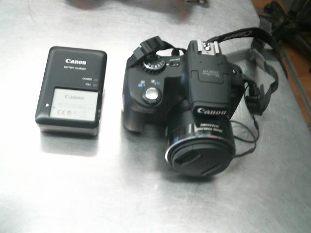 Appareil photo canon + chargeur + batt