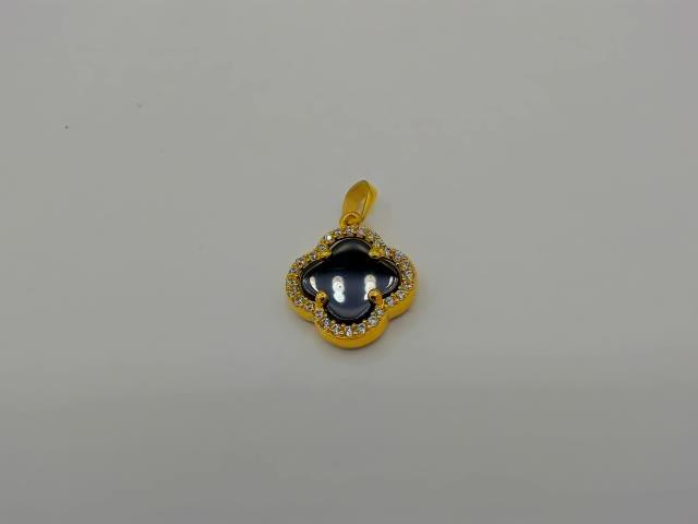 BRELOQUE EN OR 10KT NEW