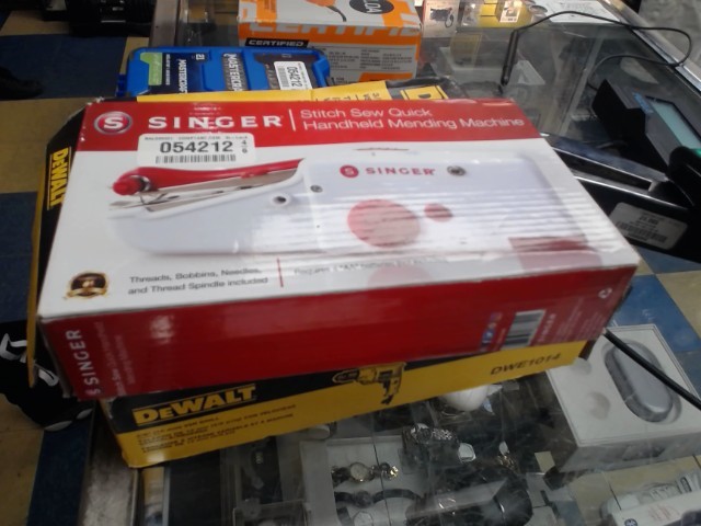 Handhled mending machine singer en boite