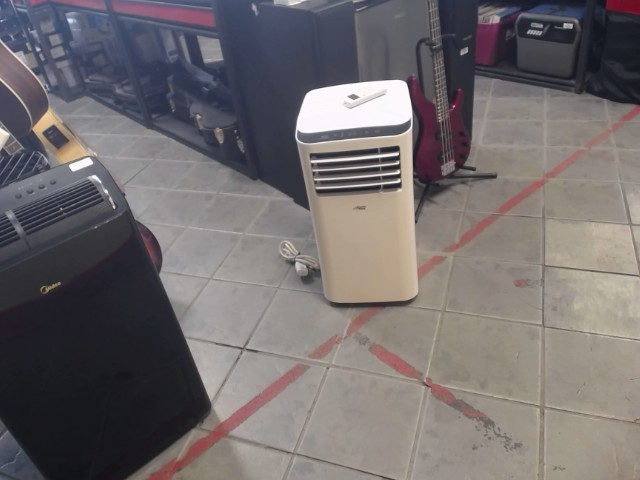 Climatiseur + telecommande et tuyau