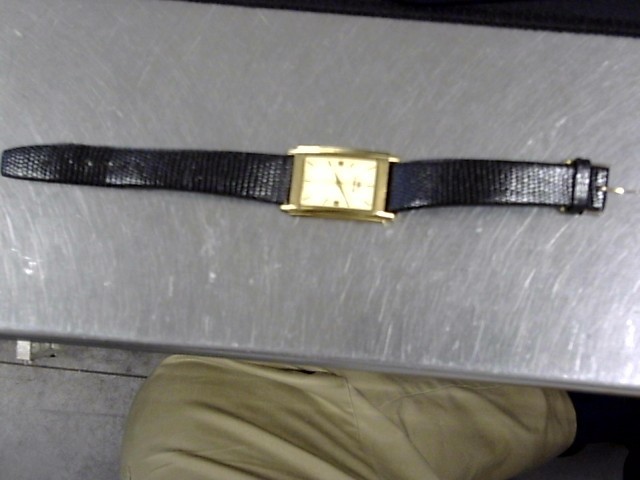 Emarson swiss quartz 18k gold