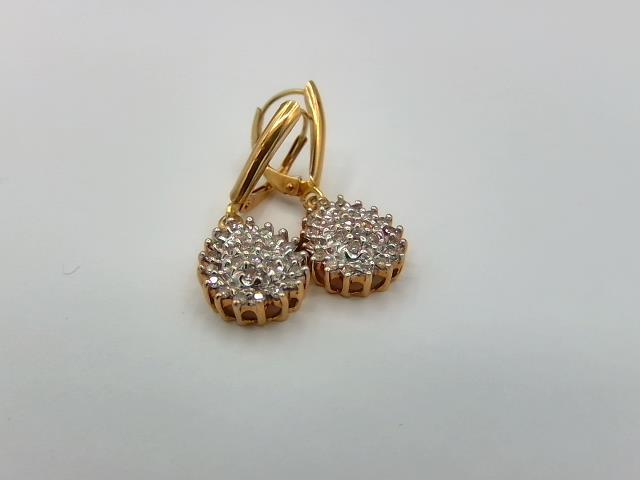 Boucles d oreilles en or 10kt avec diam
