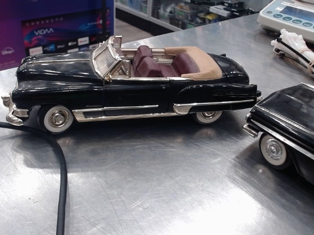 Replique cadillac coupdeville 1949 1/18