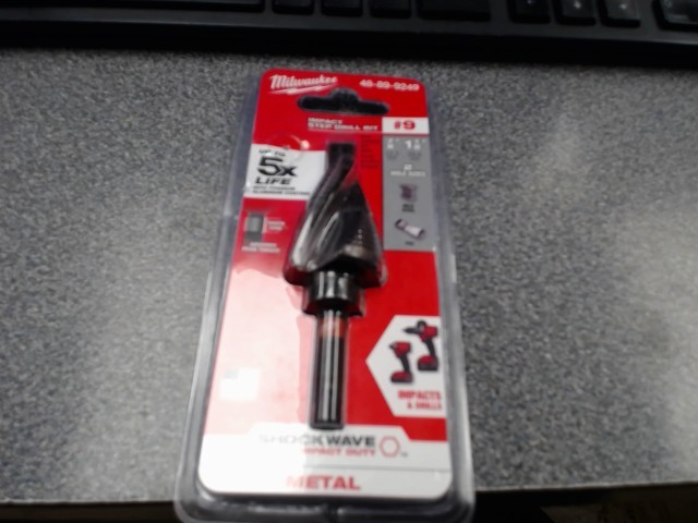 Impact step drill bit