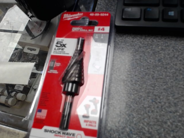 Impact step drill bit