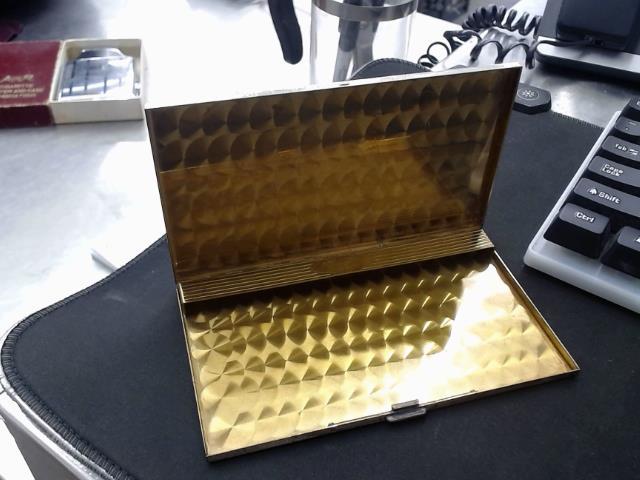 Cigarette holder silver and gold canadia