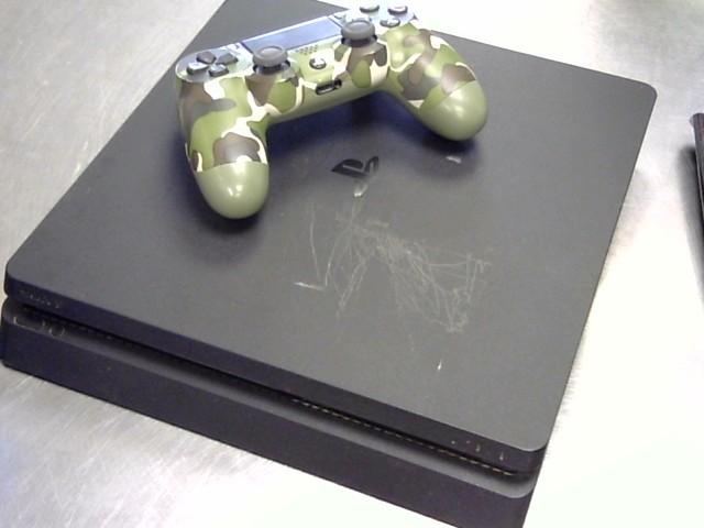Ps4 slim avec fil et man