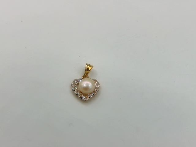 BRELOQUE EN OR 10KT NEW