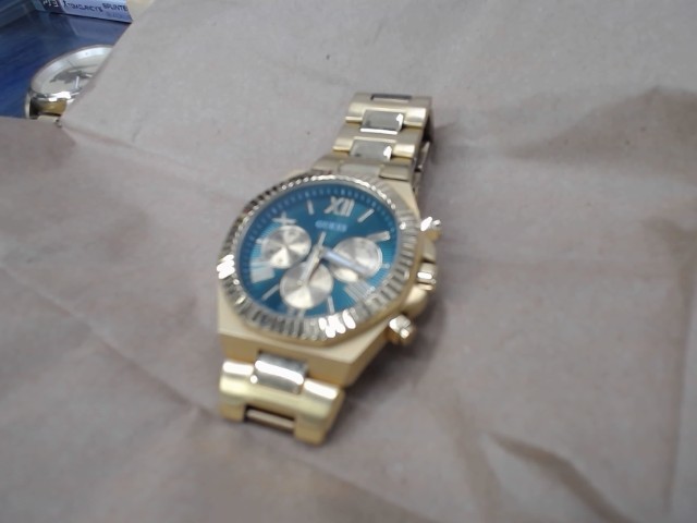 Montre guess gold cadran vert
