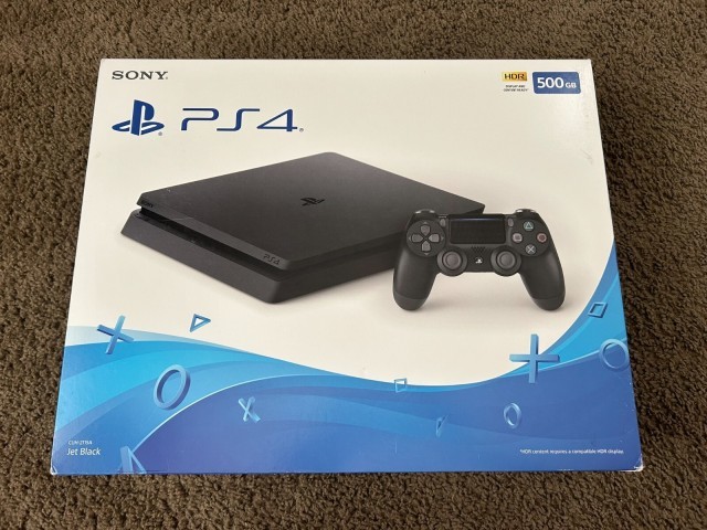 Console ps4 avec 2 ,anette et boite