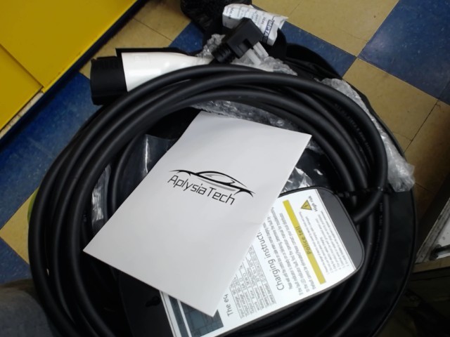 Tesla charger brand new in black case