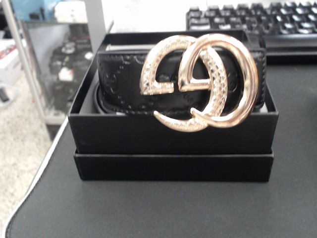 Glack and gold gucci belt