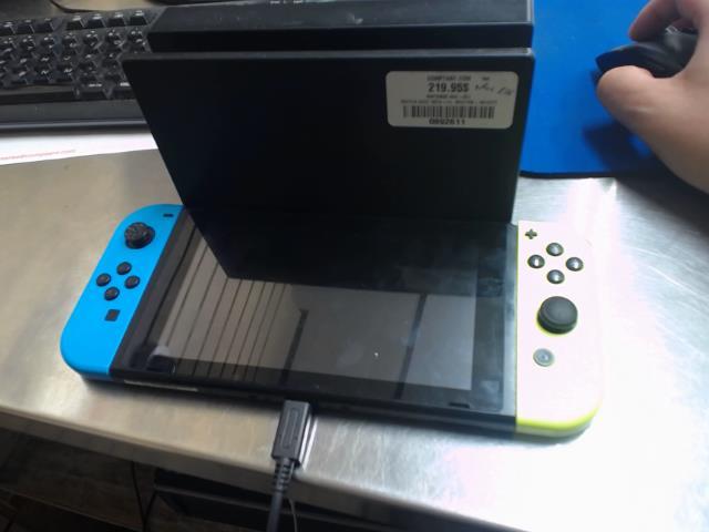Switch avec dock+fil (bouton l defect)