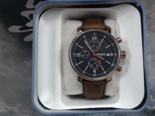 Montre fossil grise fond noir dans boite