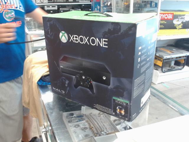 Xbox one + man + fils