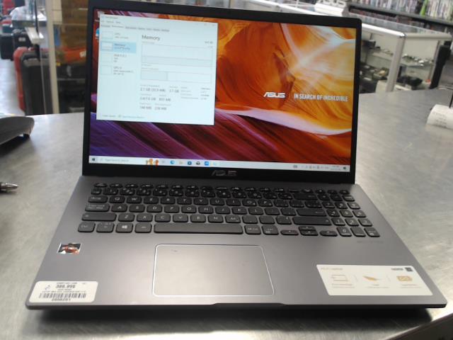 Laptop gris avec chargeur mdp:1112
