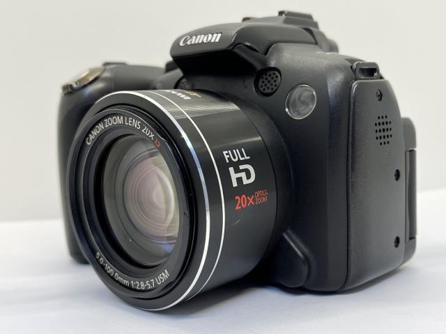 Camera lentille canon a batterie