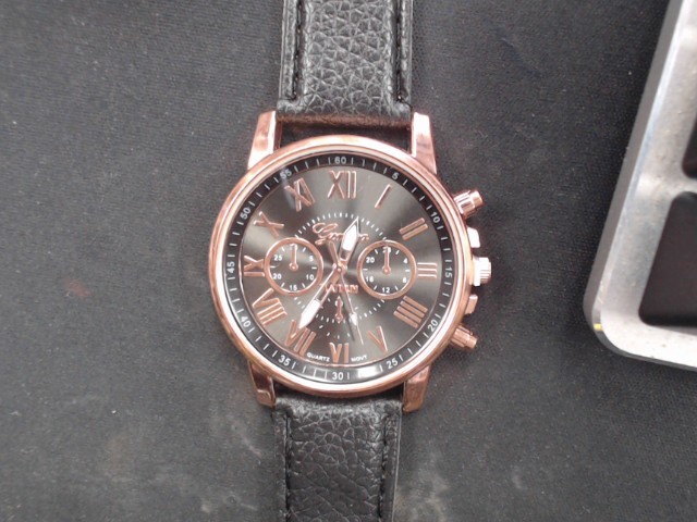 Montre noire et rose gold