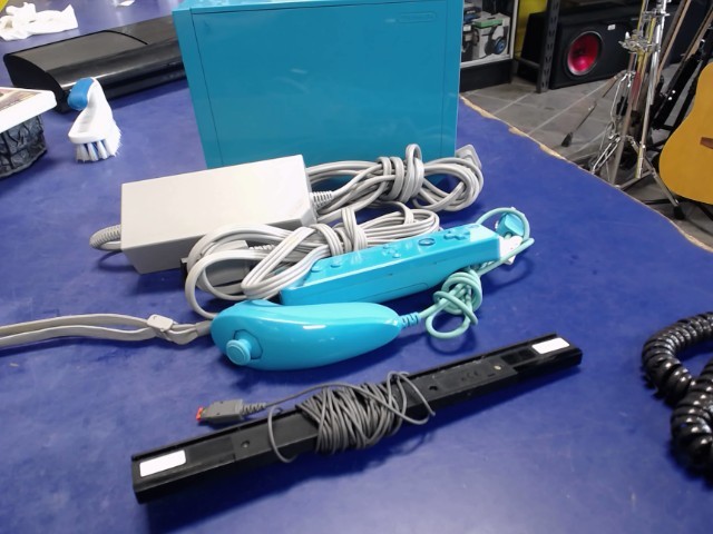 Console + man wii mote+