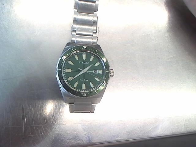 Montre citizen eco-drive verte scratch