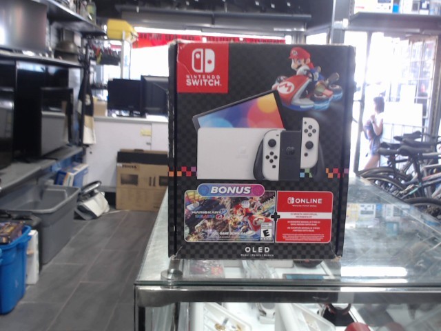 Switch blanche oled avec mannete et mari