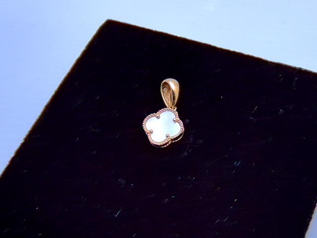 BRELOQUE EN OR 10KT  NEW