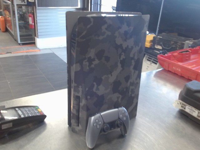 Console ps5 camouflage+man+fil ( sp)
