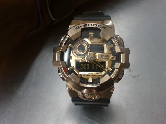 G-shock casio golden and black digital