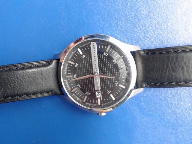 Montre stainless steel et cuir noir
