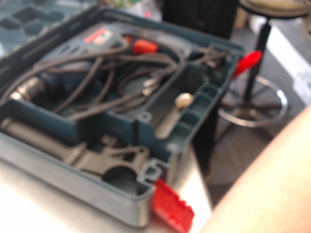 Variable speed reversing hammer drill