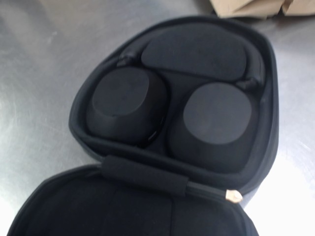 Ecouteur bluetooth dans case
