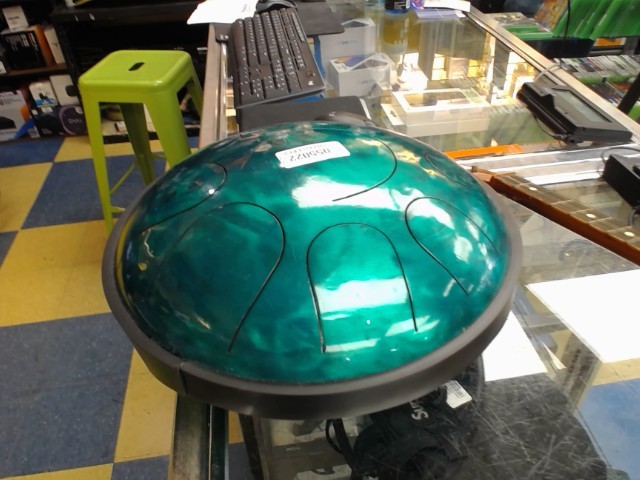 Tank drum instrument with sticks