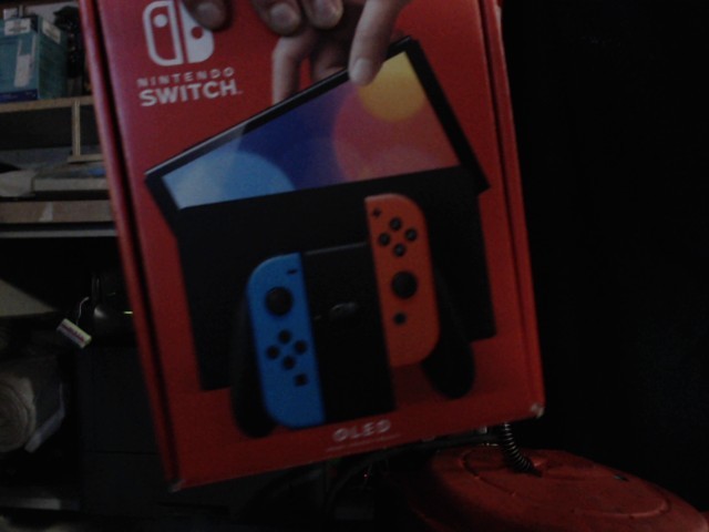 Switch oled avec box et acc