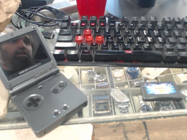 Gameboy avec chargeur et 2 jeux