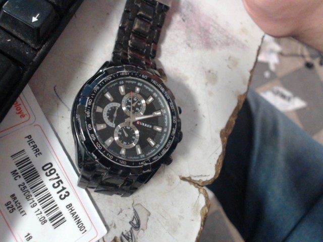 Montre noir curren