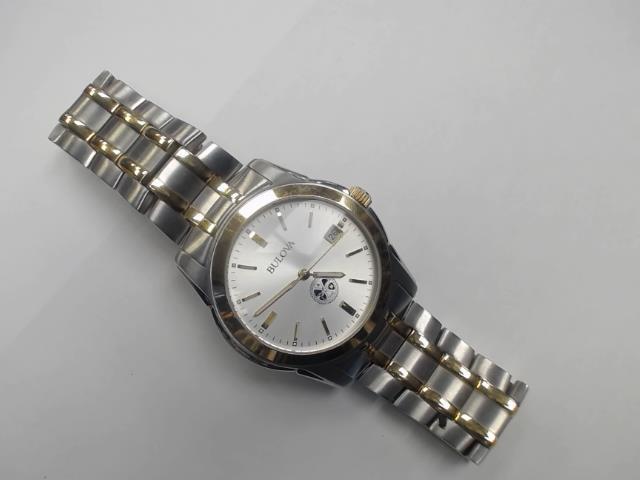 Montre bulova dore et silver