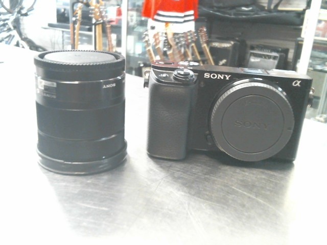 Camera avec lentille et sac