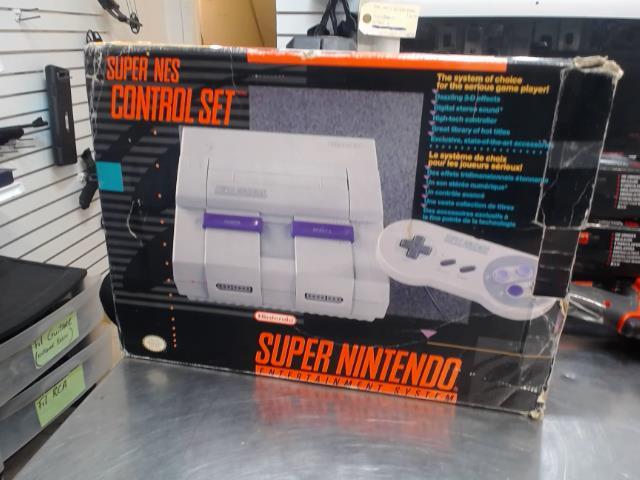 Snes avec+2 manettes + fil ds bo