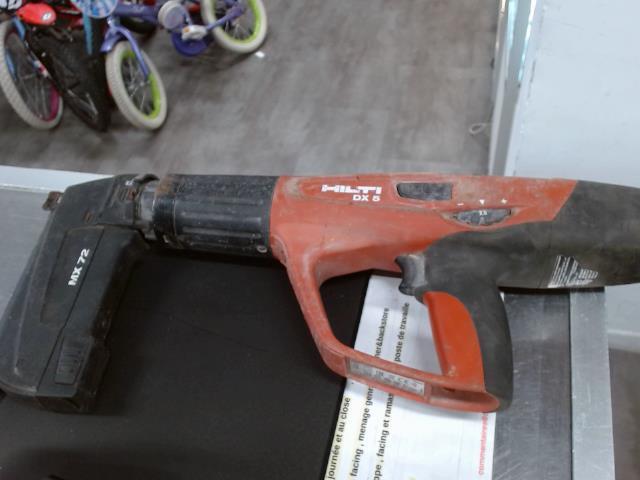 Powder actuated tool