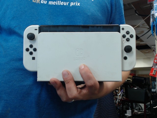 Console avec3jeux et accesoire