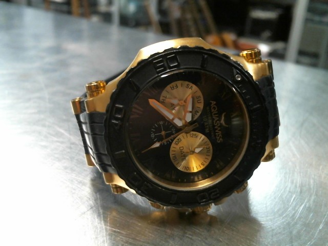 Montre pour homme quartz gold tone