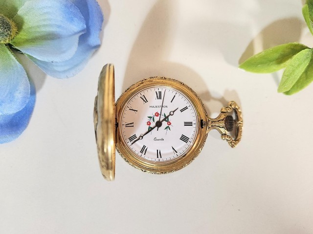 Montre de poche avec design deux chiens