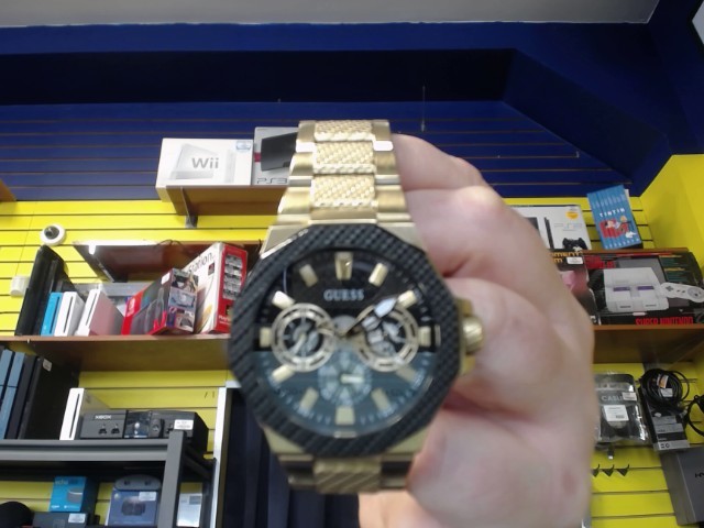 Montre analog gold tone indy comme neuve