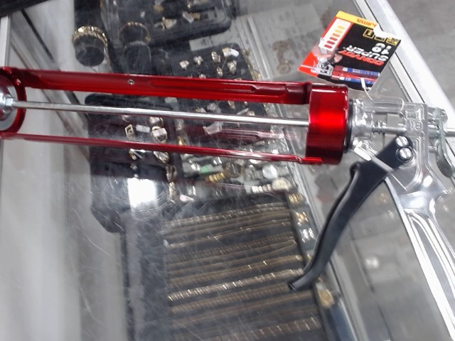 Gun a caulking rouge neuf