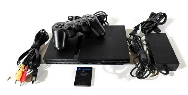 Playstation 2 avec manette et fils