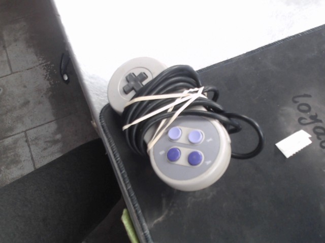 Manette de super nintendo grise