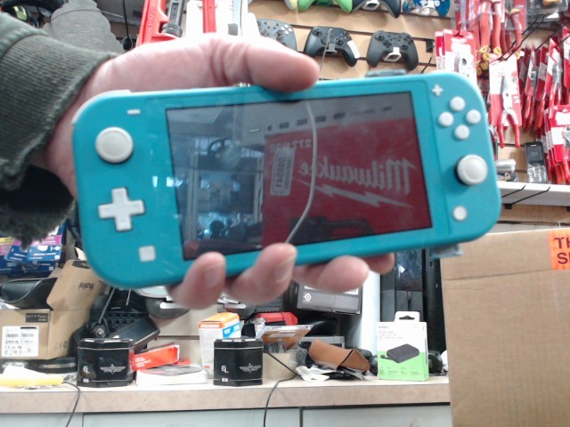 Nintendo switch lite bleu +acc