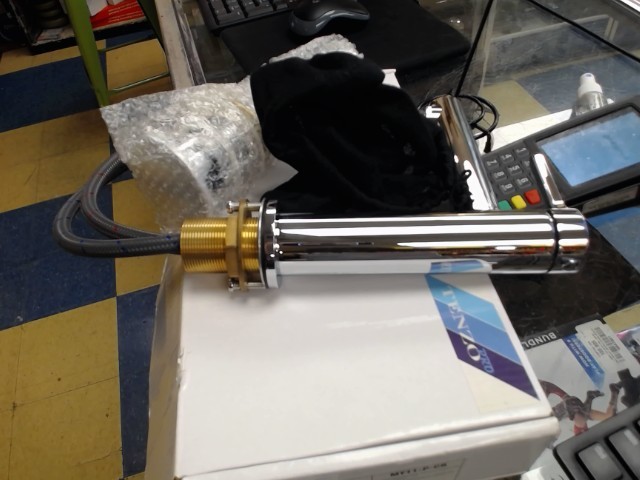 Faucet silver new in box