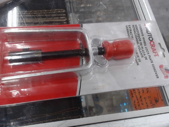 Steering wheel lock plate remover
